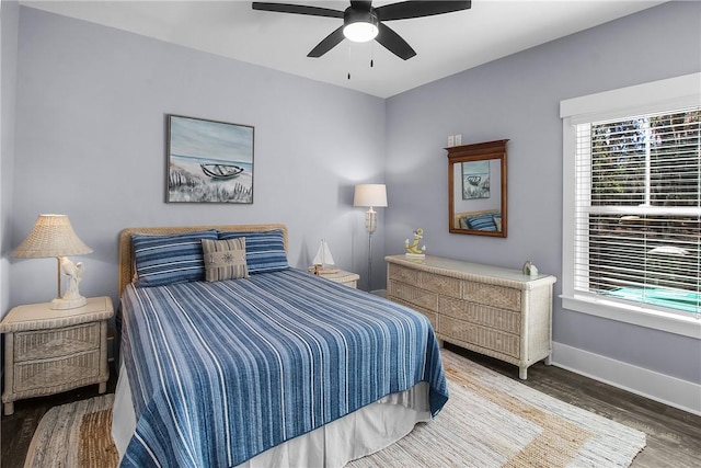 bedroom featuring ceiling fan and wood-type flooring