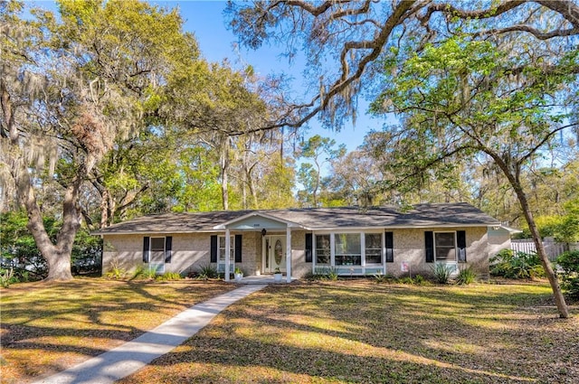 408 Couper Ave, Saint Simons Island, GA 31522 - ranch-style house featuring a porch