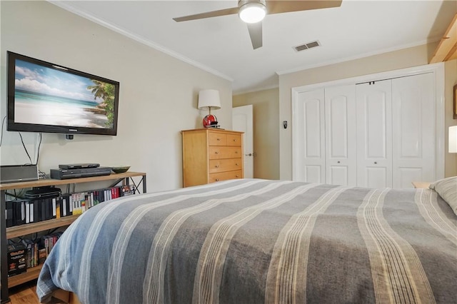 408 Couper Ave, Saint Simons Island, GA 31522 - bedroom featuring ornamental molding, a closet, and a ceiling fan