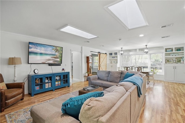 408 Couper Ave, Saint Simons Island, GA 31522 - living area featuring a skylight, light wood-type flooring, recessed lighting, and baseboards