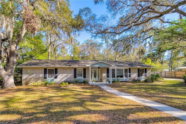 408 Couper Ave, Saint Simons Island, GA 31522 - ranch-style home with covered porch