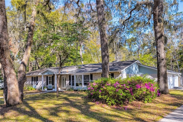 408 Couper Ave, Saint Simons Island, GA 31522 - single story home with covered porch and a front yard