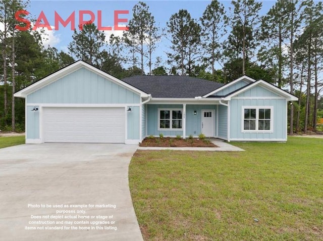 view of front facade featuring a garage and a front lawn