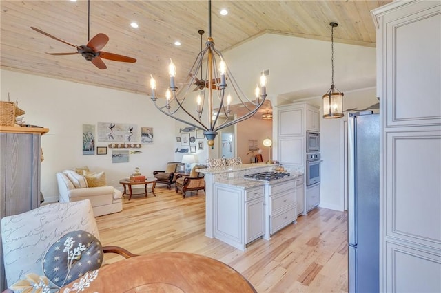 kitchen featuring wood ceiling, open floor plan, stainless steel appliances, and lofted ceiling