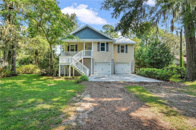 raised beach house featuring stairway, driveway, a porch, a front lawn, and a garage