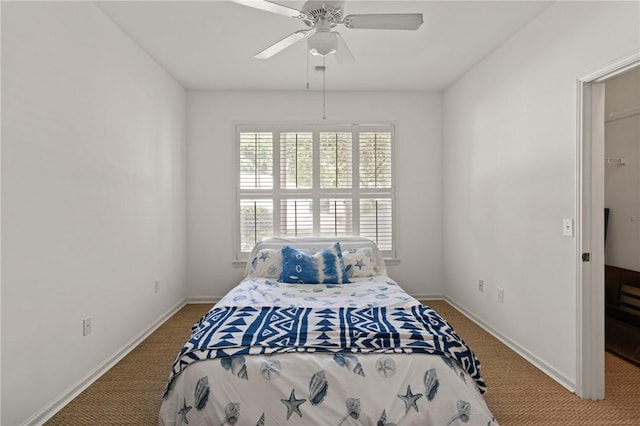 1704 Frederica Rd Unit 508, Saint Simons Island, GA 31522 - bedroom featuring carpet flooring, baseboards, and ceiling fan