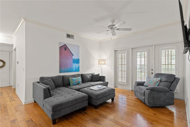 1704 Frederica Rd Unit 508, Saint Simons Island, GA 31522 - living room featuring crown molding, a ceiling fan, and light wood finished floors