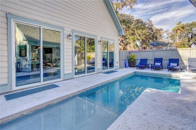 view of pool featuring a patio area