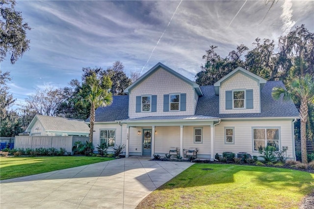 view of front of home featuring a porch and a front yard