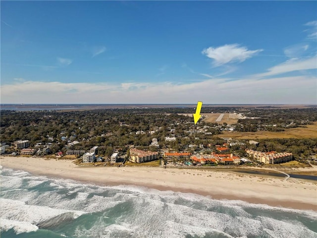 aerial view featuring a water view and a beach view