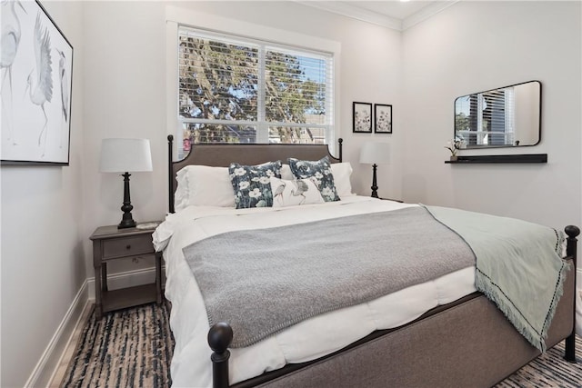 bedroom featuring crown molding