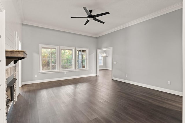 unfurnished living room with ceiling fan, crown molding, and dark wood-type flooring