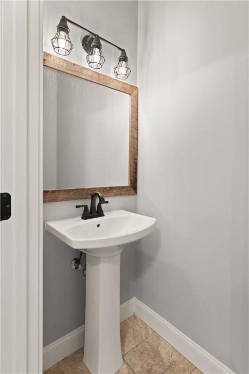 bathroom with tile patterned flooring