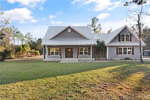 view of front facade with a front lawn and a porch