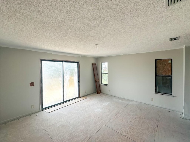 47 Marsh View Ct, Saint Marys, GA 31558 - spare room with a textured ceiling