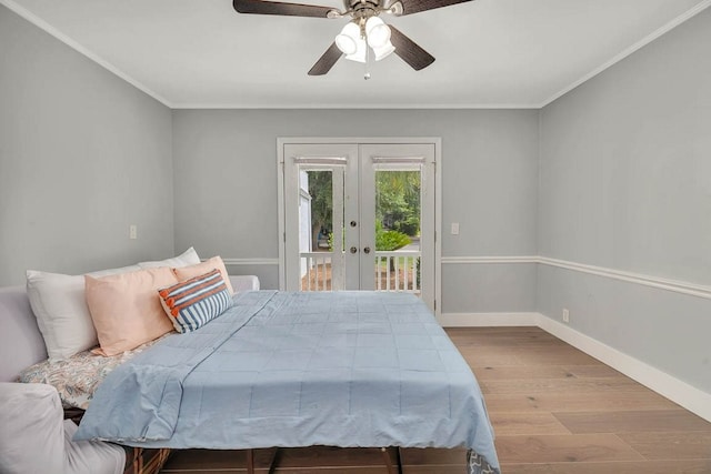 bedroom with access to exterior, french doors, ceiling fan, crown molding, and light hardwood / wood-style floors