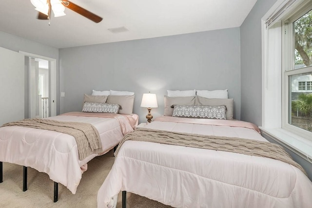 bedroom with carpet and ceiling fan