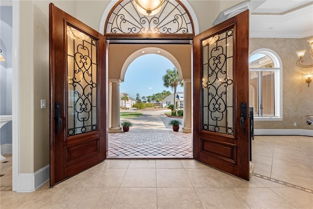 tiled entryway with ornamental molding