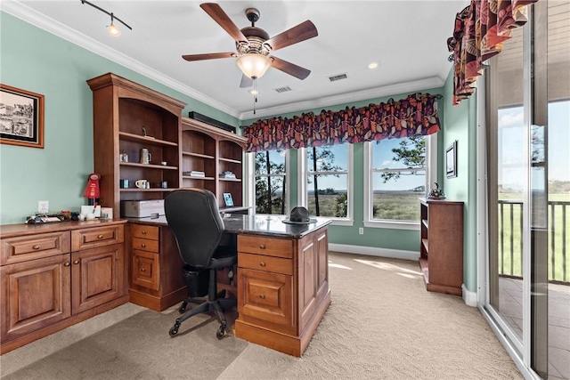 office area with ceiling fan, light colored carpet, and ornamental molding