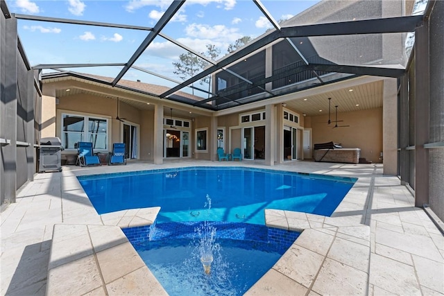 view of pool with a grill, a lanai, a patio area, and ceiling fan