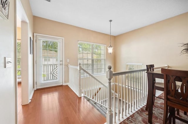 118 Drayton Cir, Brunswick, GA 31525 - stairs featuring hardwood / wood-style flooring and baseboards