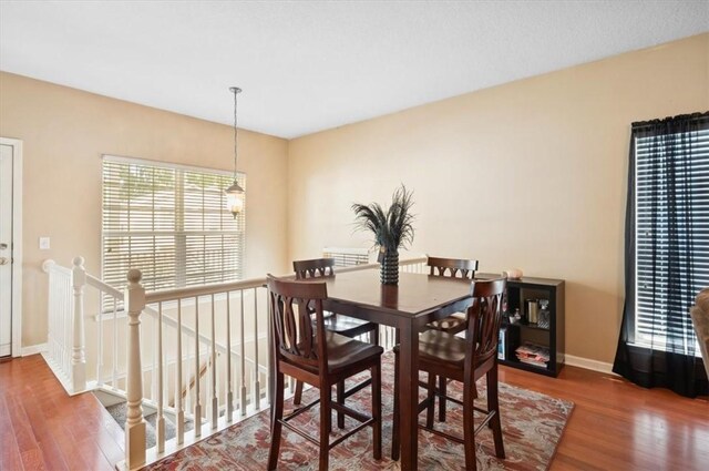 118 Drayton Cir, Brunswick, GA 31525 - dining room featuring wood finished floors and a chandelier