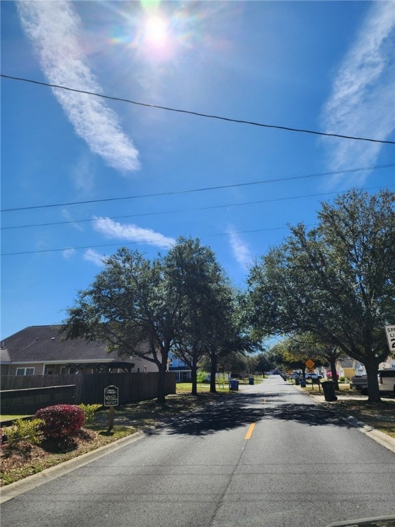 view of road with curbs