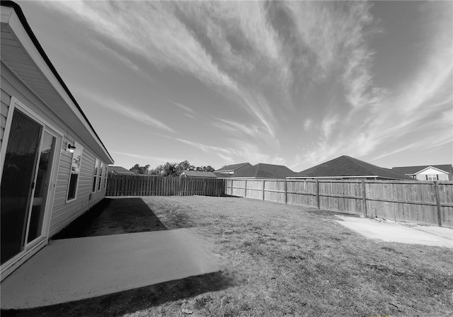 view of yard featuring a fenced backyard