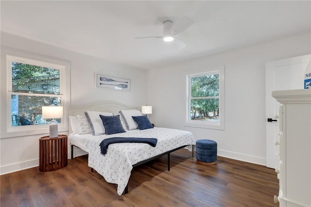 bedroom featuring dark hardwood / wood-style floors and ceiling fan