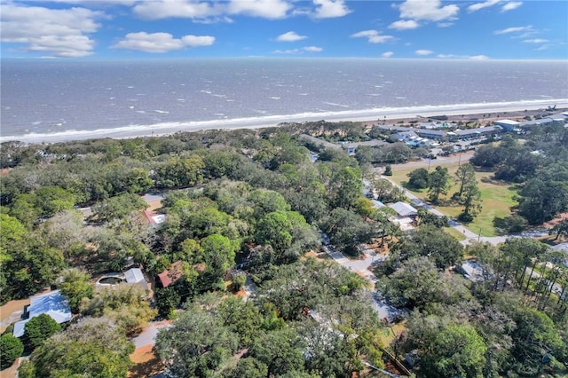 bird's eye view with a water view and a beach view