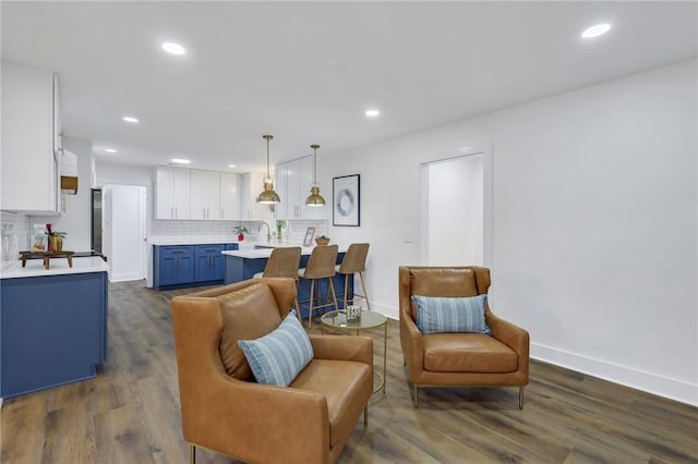 interior space with sink and dark hardwood / wood-style floors