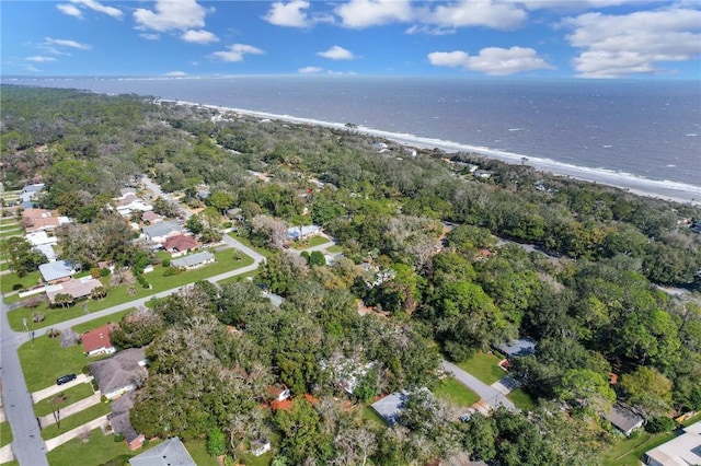 bird's eye view with a water view and a view of the beach