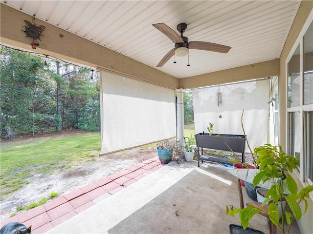 view of patio / terrace featuring ceiling fan