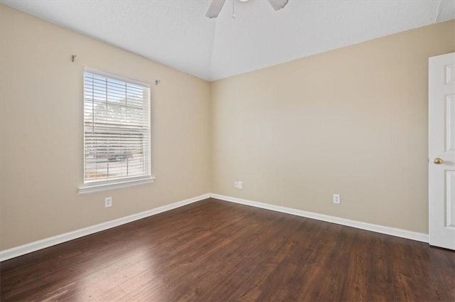 unfurnished room with a textured ceiling, dark hardwood / wood-style flooring, and ceiling fan