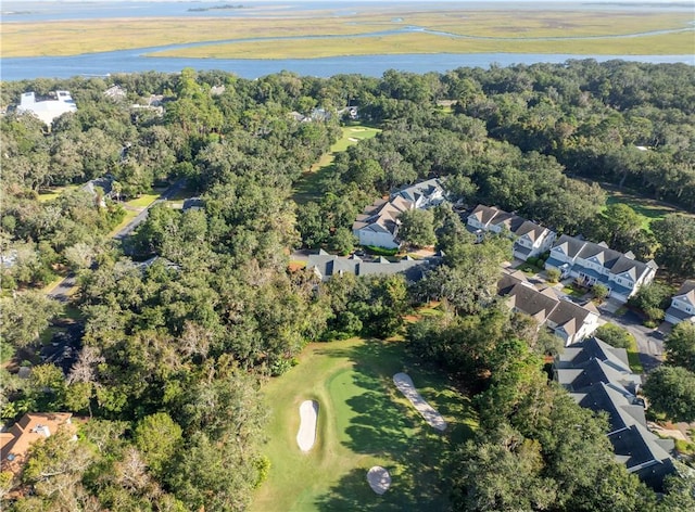 drone / aerial view featuring a residential view, a water view, and golf course view