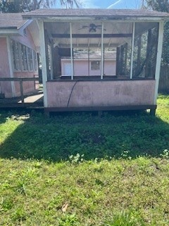 exterior space featuring a sunroom