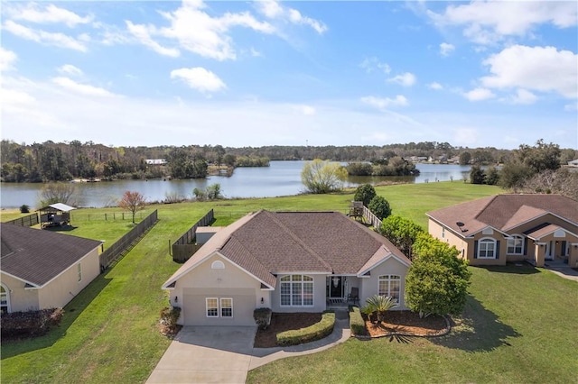 drone / aerial view with a water view