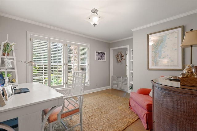 office featuring hardwood / wood-style flooring and ornamental molding