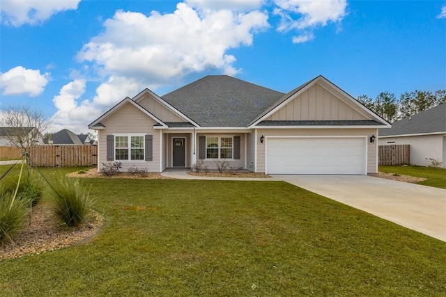 craftsman house with a garage and a front lawn