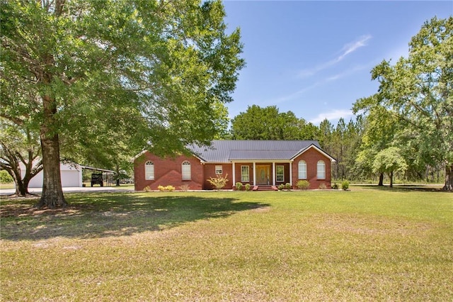 ranch-style home with a front yard and a carport