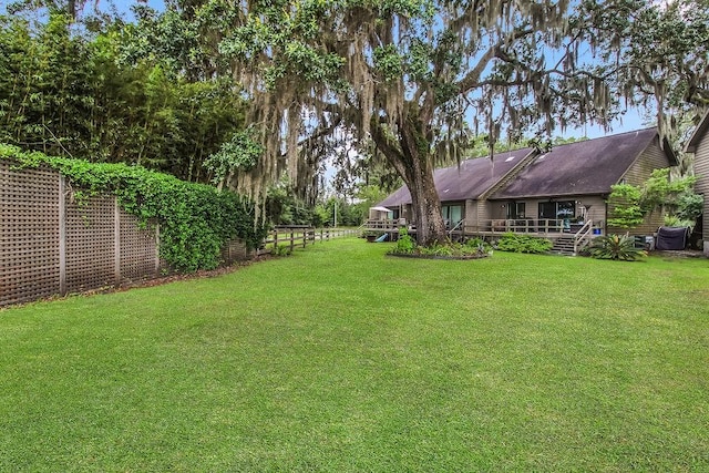 1020 NE Pine Point Ln, Townsend, GA 31331 - view of yard with a wooden deck