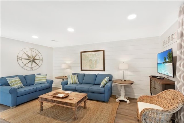 living room with light hardwood / wood-style flooring