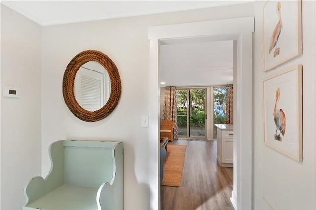 hall with light hardwood / wood-style floors