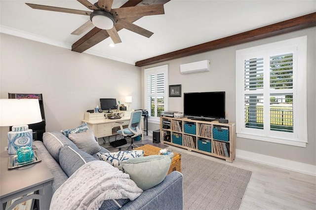 living room featuring light hardwood / wood-style flooring, ceiling fan, a wall unit AC, ornamental molding, and beamed ceiling