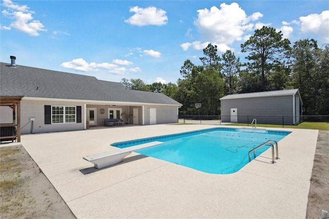 2604 Smith Rd SE, Townsend, GA 31331 - view of pool with a patio area, a diving board, and ceiling fan