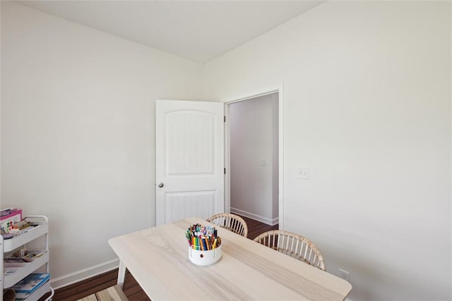 2604 Smith Rd SE, Townsend, GA 31331 - dining area featuring baseboards and dark wood finished floors