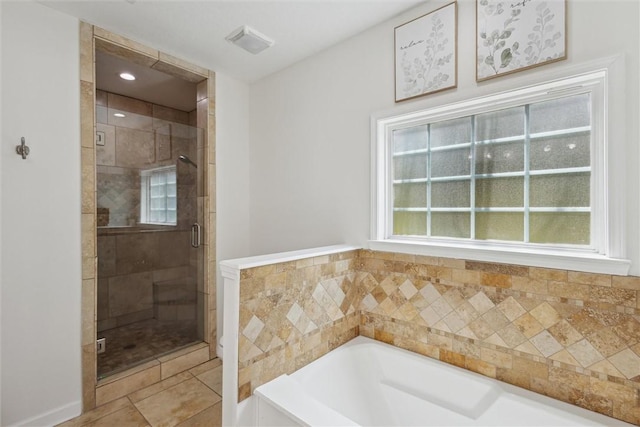 2604 Smith Rd SE, Townsend, GA 31331 - bathroom with a bath, a stall shower, and plenty of natural light