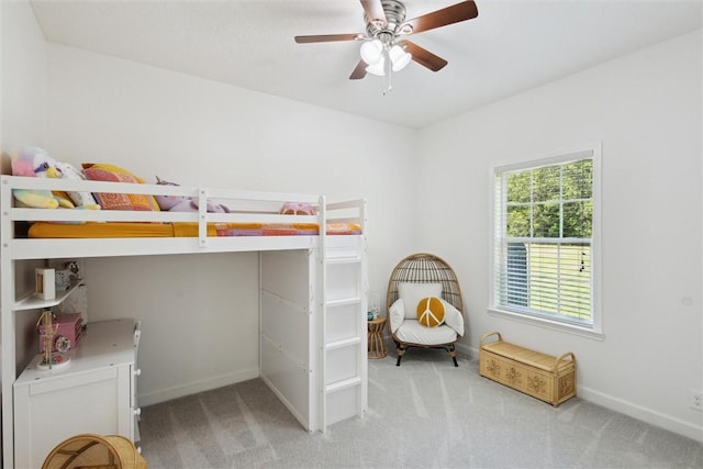 2604 Smith Rd SE, Townsend, GA 31331 - carpeted bedroom with baseboards and ceiling fan