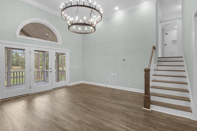 1079 Mayflower Rd NE Unit B, Townsend, GA 31331 - interior space featuring french doors, wood finished floors, baseboards, a notable chandelier, and stairs