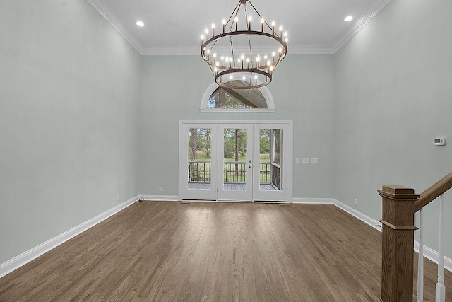 1079 Mayflower Rd NE Unit B, Townsend, GA 31331 - interior space with dark wood-style flooring, a high ceiling, an inviting chandelier, french doors, and baseboards